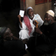 People wait for the opening of the polling office at Hamdalaye neighbourhood during a presidential election in Conakry, Guinea October 11, 2015. REUTERS/Luc Gnago – RTS3XVP